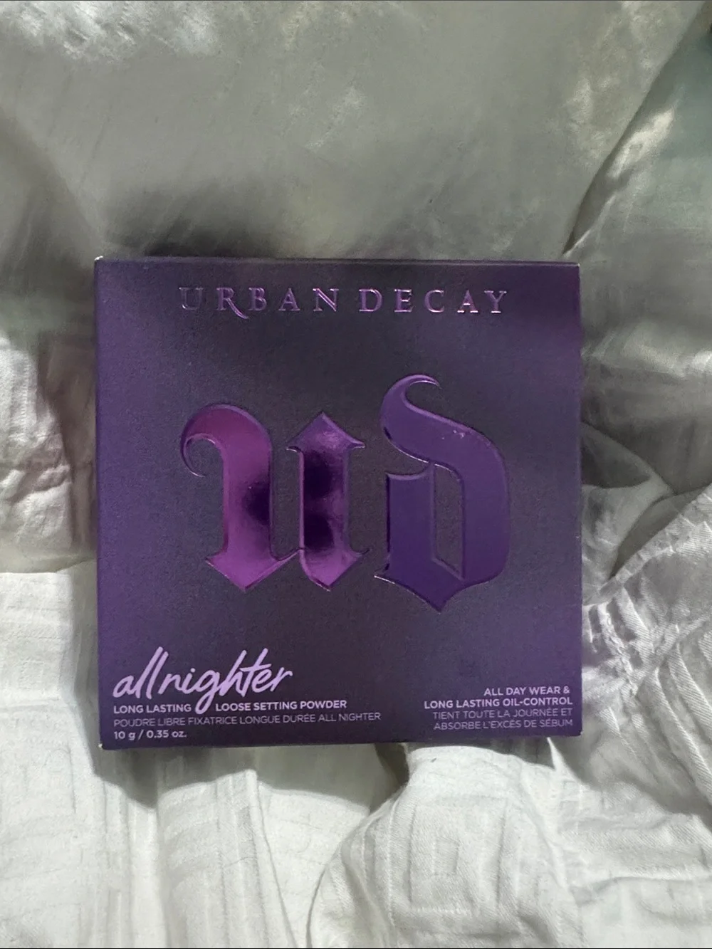 Urban Decay all nighter translucent softening loose setting powder.